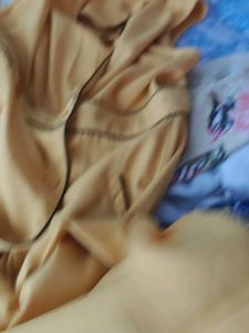 Bold in Yellow: Sleek Sleeveless Dress for Every O