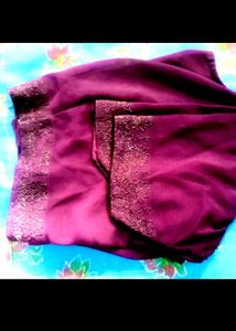 A Purple Colour Saree With Blouse