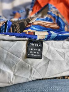 3111. Patterned Halter Top