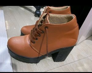 A Pair Of Beautiful Casual Tan Boot For Ladies.