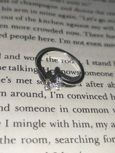 Silver diamond rings.