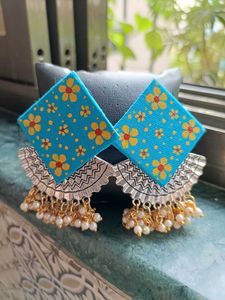 A Handmade Beaded Fabric Earnings