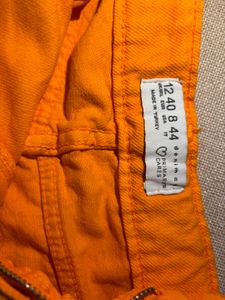Primark Cares Bright Orange Denim Fringe Shorts