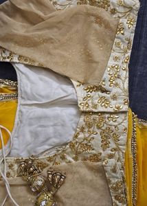 Yellow Border Saree With Golden Blouse