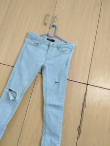 Low Waist Light Blue Ripped Jeans