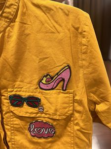 Cool Shirt With Colourful Badges