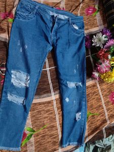 Ripped Blue Denim Jeans