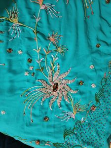 Teal Blue Colour Saree With Heavy Work Pallu.