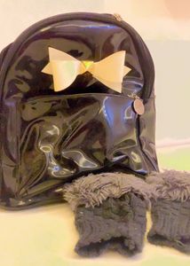 1 Glossy Bag And One Paid Of Globed