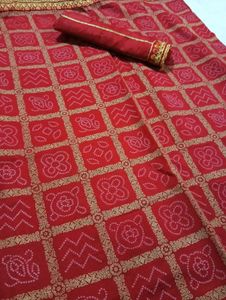 Red Saree With Golden Print Work