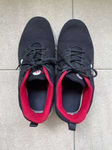 Red and Black Coloured Running Shoes
