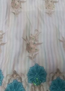 Elegant Embroidered Kurta in firozi colour