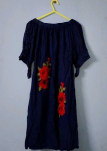 A Beautiful Western Dress With Red Roses