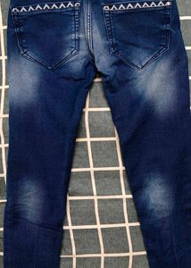 Washed Jeans with Insert Pockets