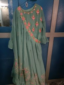 A Georgette Gown With embroidered Shrug.
