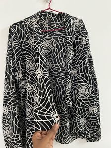 Patterned Black Shrug Top