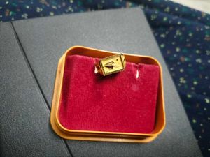 Gold Ring on Scale
