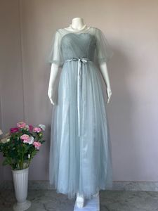 Soft tulle dusty blue gown