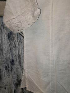 White Colored Shirt With Net Work On Front Sleeves