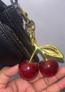 COACH DUPE RED CHERRY CHARM KEYCHAIN