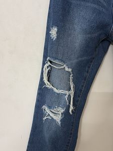 Ripped Blue Denim Jeans