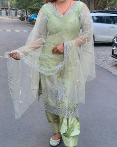 Elegant Green Salwar Suit With Net Dupatta