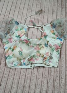 Deep Neck Sleeveless Blouse