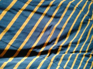 Yellow stripe top wear