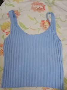 beautiful sky blue top. good condition worn only once. can style with black or blue jeans and with skirts . looks super classy.