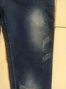 Skinny Blue Jeans With Distressed Pattern