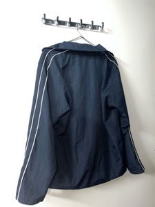 Navy Windbreaker Jacket With White Strips On Arms