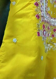 Yellow Salwar Kameez with Pink Dupatta