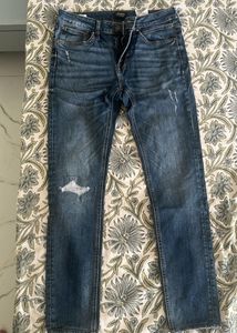 Distressed Denim Jeans