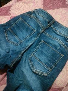 Ripped High-Waisted Jeans