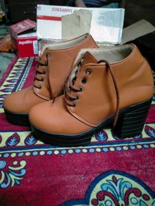 A Pair Of Beautiful Casual Tan Boot For Ladies.