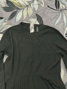 Elegant Black Pleated Dress