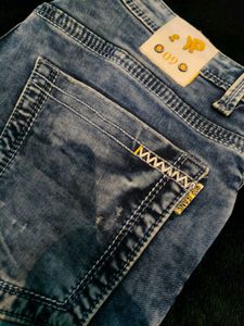 Distressed Denim Jeans