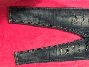 Ripped Blue Denim Jeans