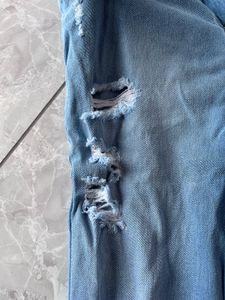Ripped Light Wash Jeans