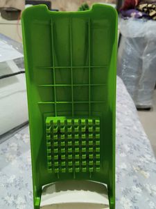multipurpose green chopper with 7 attachments