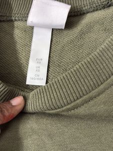 olive green sweatshirt + free gift