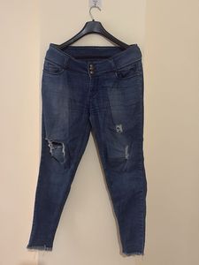 Ripped Blue Denim Jeans