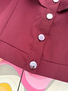 Maroon Ruffle Button-Down Top