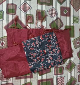 Maroon Shiny Plain Saree From Chillori With Floral Blouse.