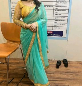 Elegant Aqua & Gold Border Saree