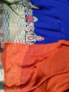 Elegant Blue and orange Saree with golden net