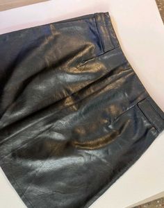 Zip-Up Leather Skirt With WaistBuckle Embelishment