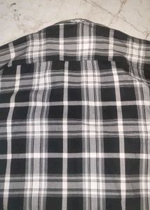 checked black and white shirt