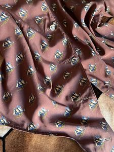 crazy button up top with a tying knot down