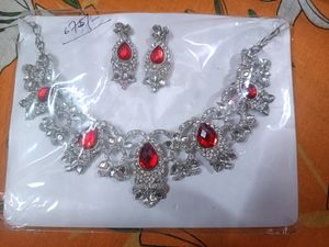 Silver Color Necklace With Imbeded Red Stone